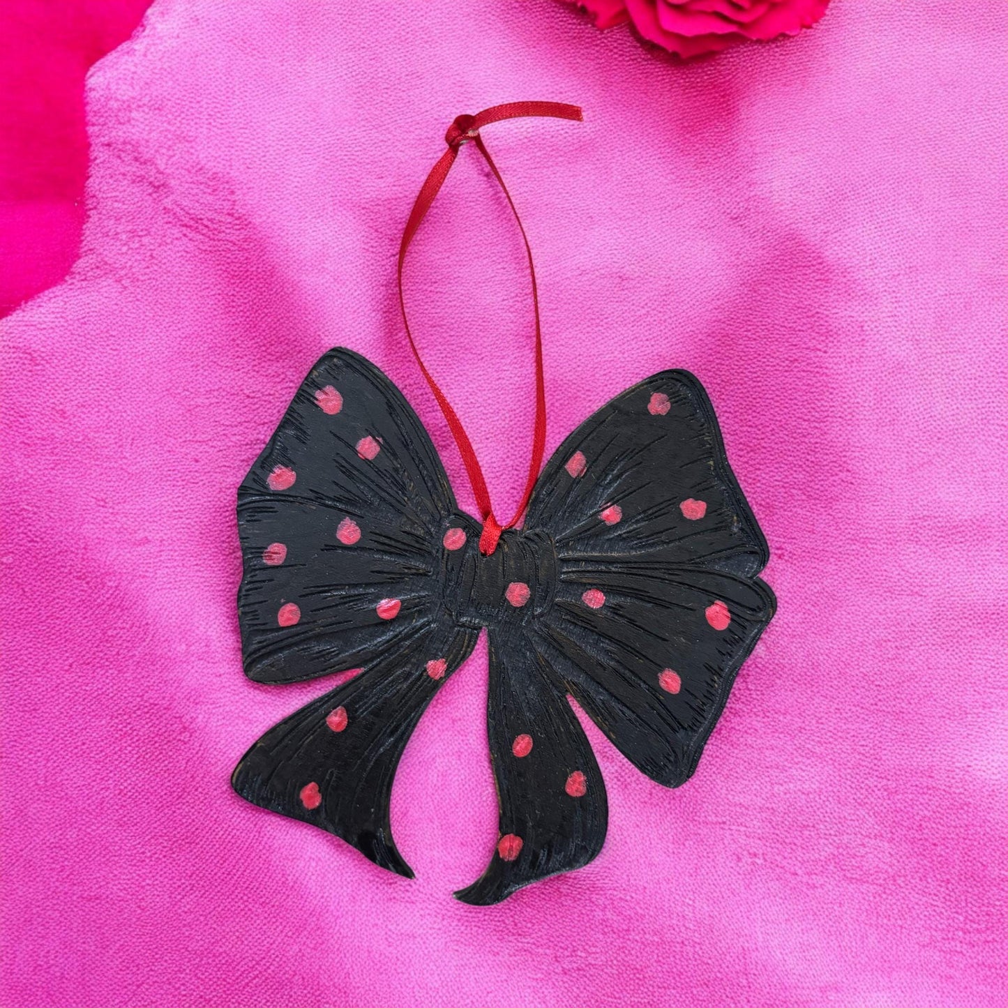 Hand-Painted Wooden Bow Ornament: Black and Red Spotted Decor