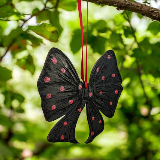 Hand-Painted Wooden Bow Ornament: Black and Red Spotted Decor